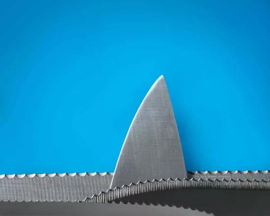 Sirris Qualiknife COOCK project knife points placed against blue background